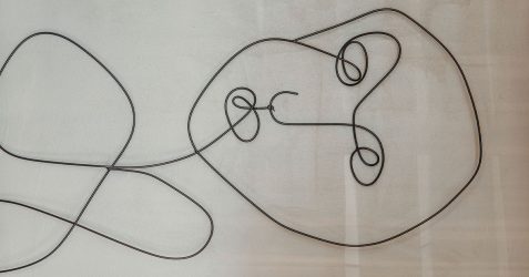 Contemporary abstract wall art featuring Terrazzo GraniTech plaster, showcasing a modern interpretation of decorative plaster types