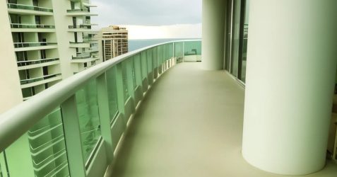 Seamless modern balcony finished with Terrazzo GraniTech waterproofing system, showcasing how to waterproof a balcony for high-rise buildings